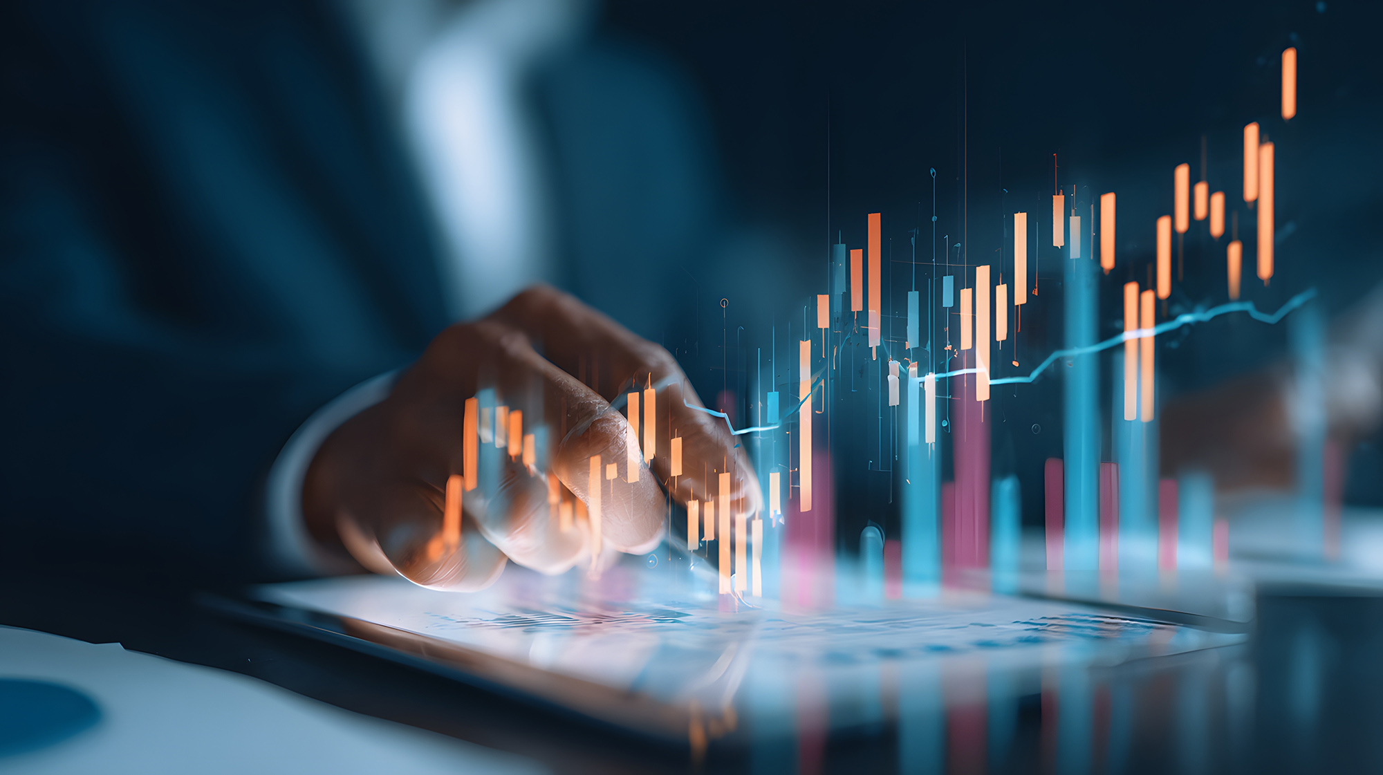 Business professional interacting with a tablet displaying a digital financial chart with rising data bars and trend lines.