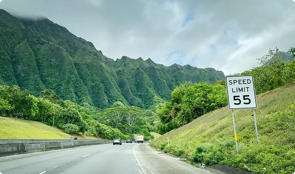 Street view form Interstate H-3 highway called John A. Burns Freeway driving west on the Hawaiian island of Oahu, USA.
