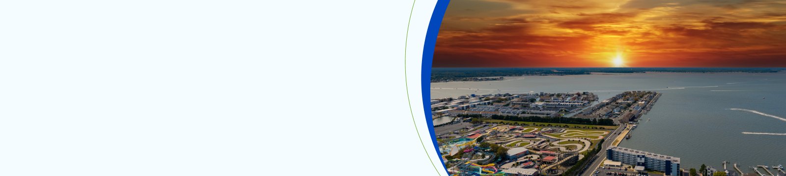 Ocean City Maryland USA - 8 30 2025: Aerial shot of the hotels, amusement parks and shops on a peninsula with Atlantic ocean in Ocean City Maryland USA
