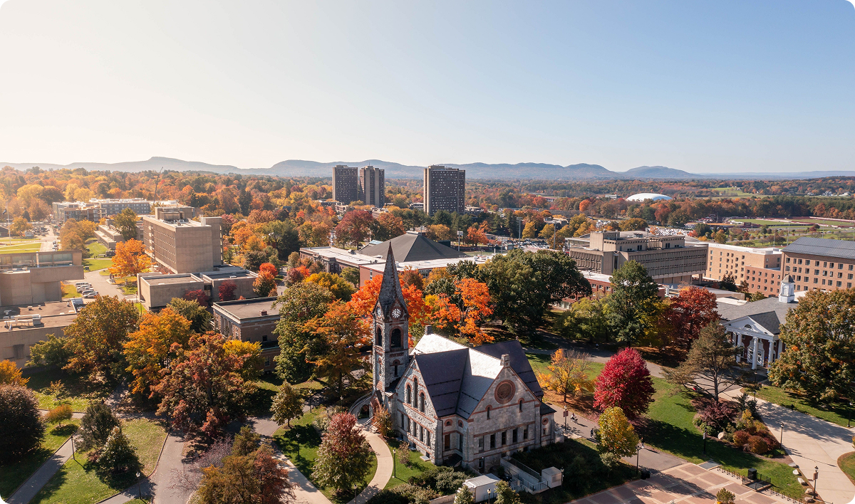 An aerial shot of the University of Massachusetts Amherst campus on a sunny autumn day